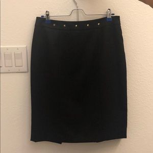 Black pencil skirt with gold stud embellishment